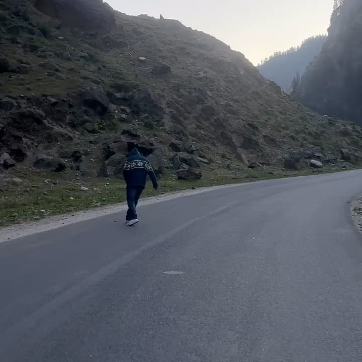Walking a mountain road in Uttarakhand